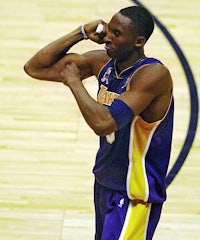 kobe bryant of the los angeles lakers celebrates after winning the nba championship