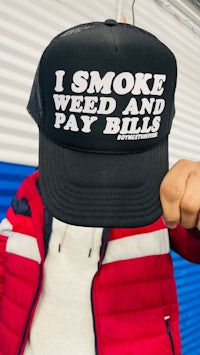 i smoke weed and pay bills trucker hat