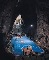 a basketball court inside a cave